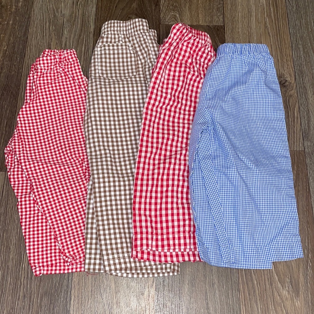 Four pairs of plaid pants